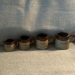 Vintage ceramic crocks measuring cups various sizes